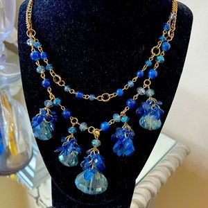 Gold plated with blue stones